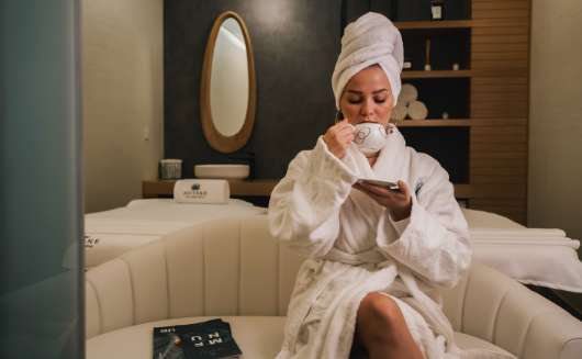 woman at a spa listening to spa music radio