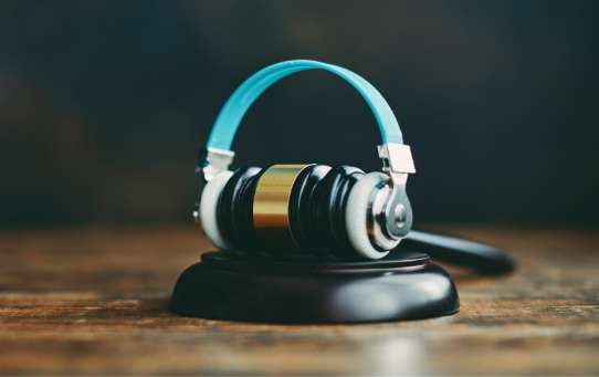 ASCAP vs. BMI: What You Need to Know About Streaming Music Legally In Your Business