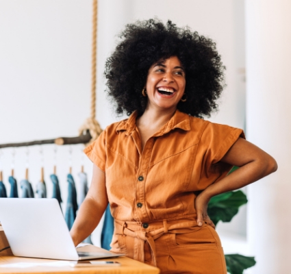 A business owner enjoying Soundtrack Your Brand at work.